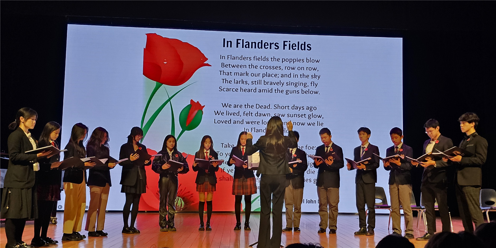 DCB students singing In Flanders Fields