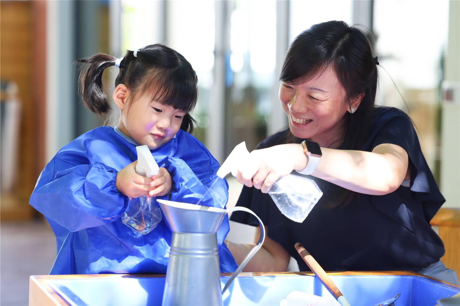 Young student learning with a teacher