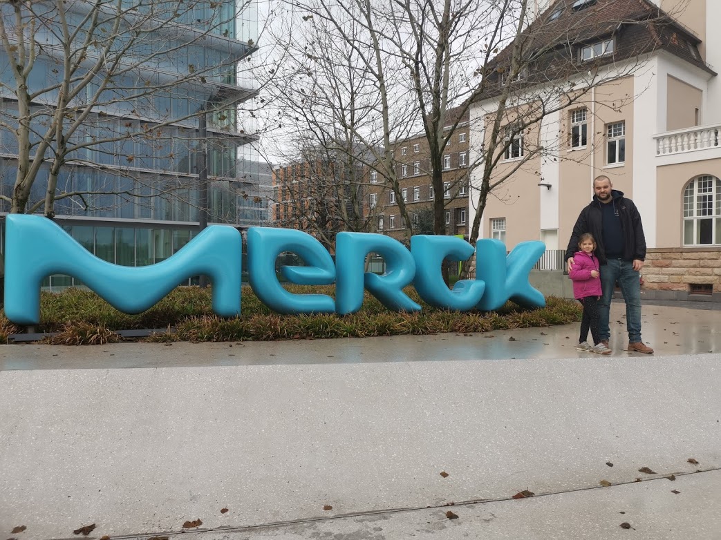 Daniel and his daughter at Merck