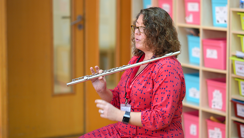 Rachel demonstrates basic flute fingering