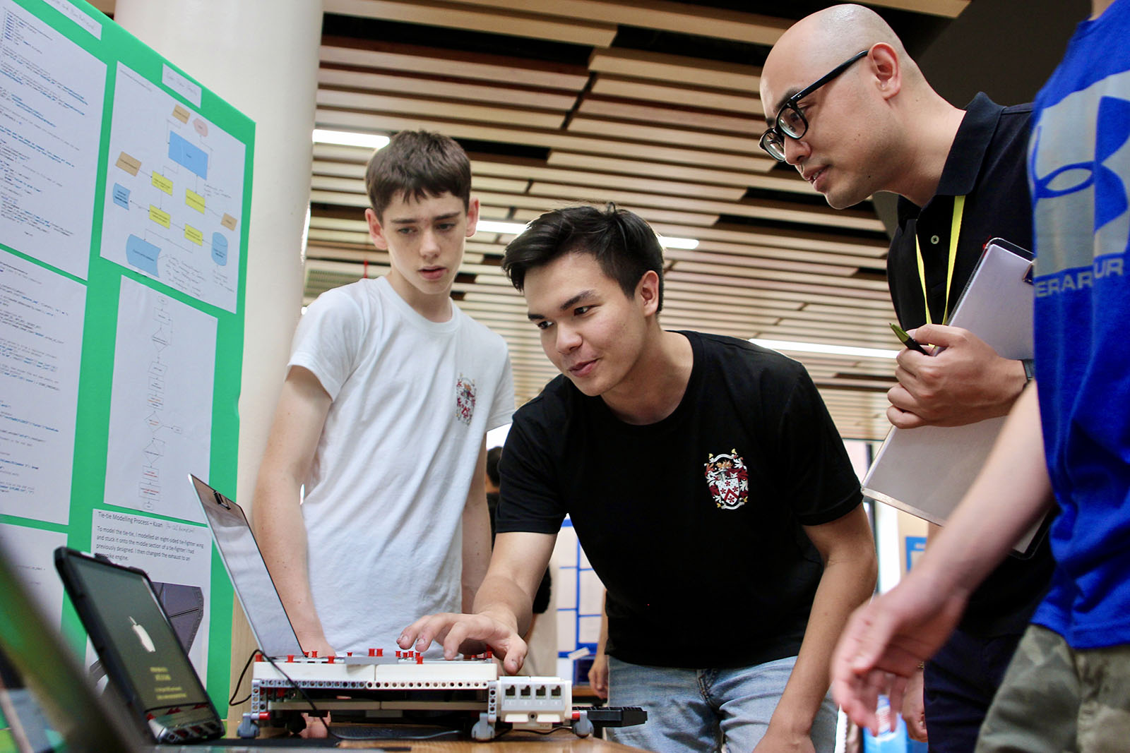 A Tech Ambassador judges a HakD presentation