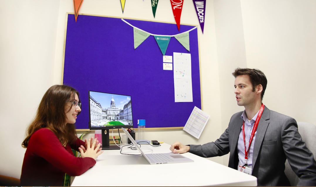 Mr. Macdonald counsels a Senior School student