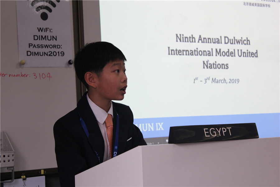 Student speaking at DIMUN IX Conference