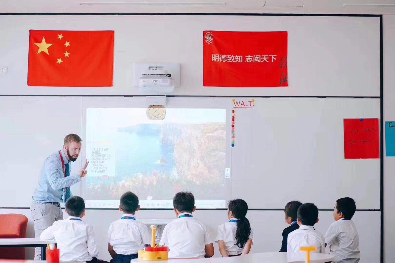 Dehong English teacher introducing himself to his new students