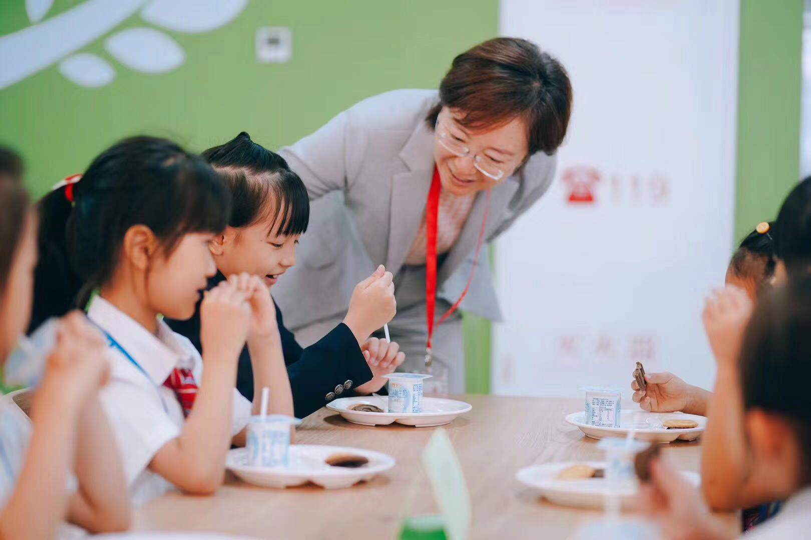 Dehong students enjoying school snacks in the cafeteria