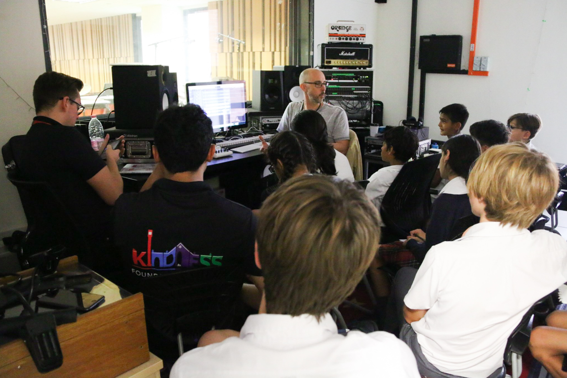 Roo Pigott shows Dulwich students how to do sound mixing
