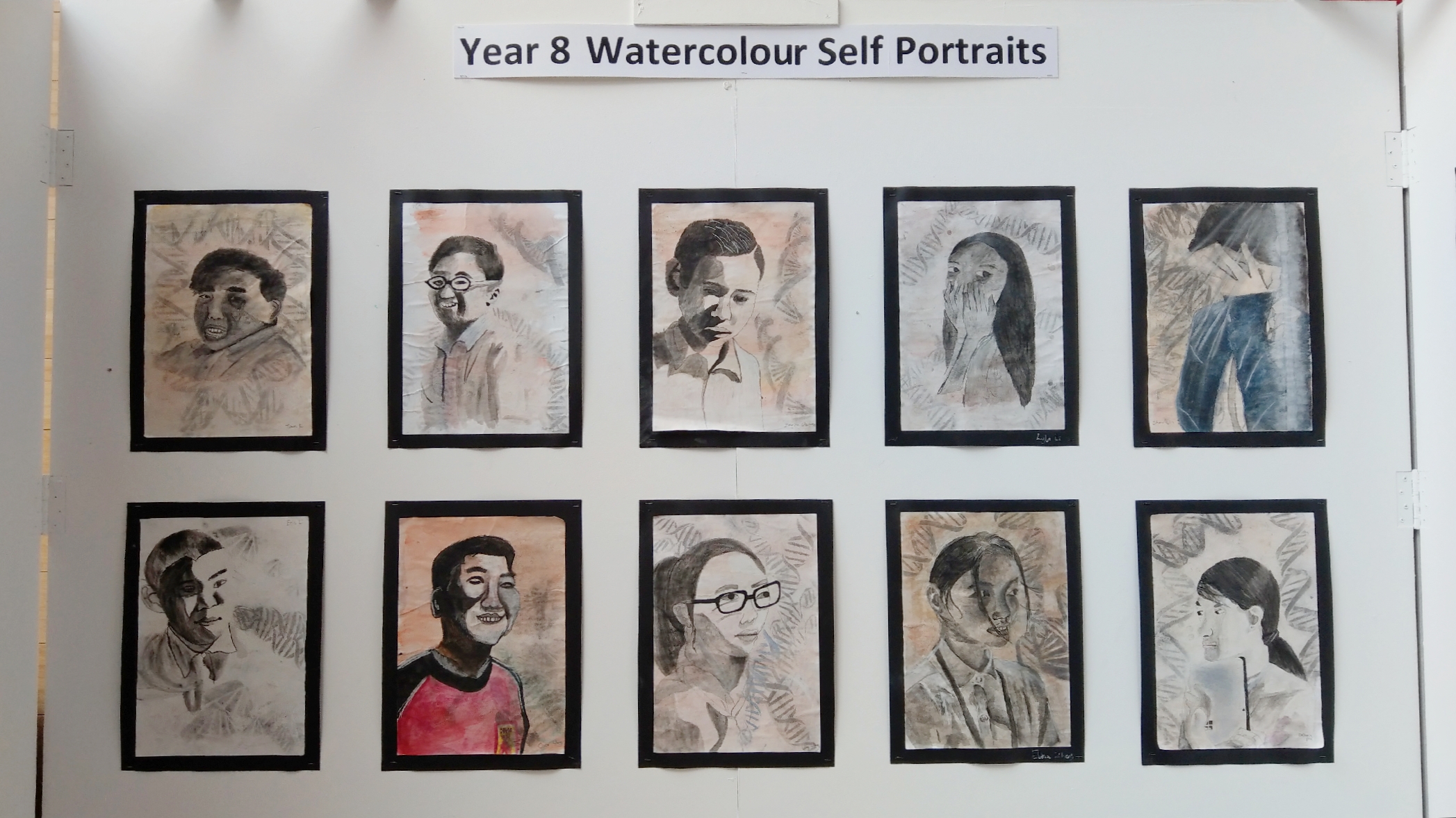 DCB Key Stage 3 exhibition ''Paint Print Draw Sculpt'' - Year 8 Watercolour Self Portraits