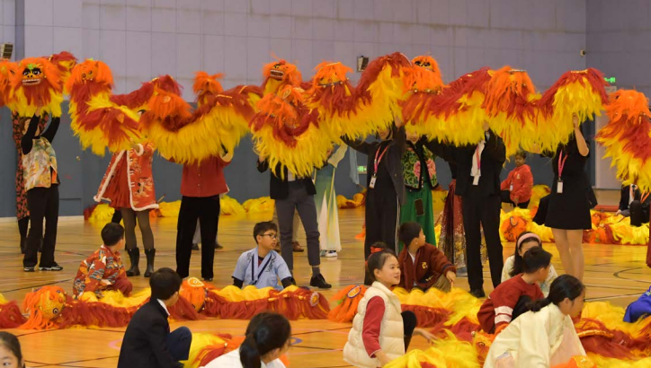 Senior School students in Maqiao Culture Heritage Hand Lion Dance CCA is at practice.