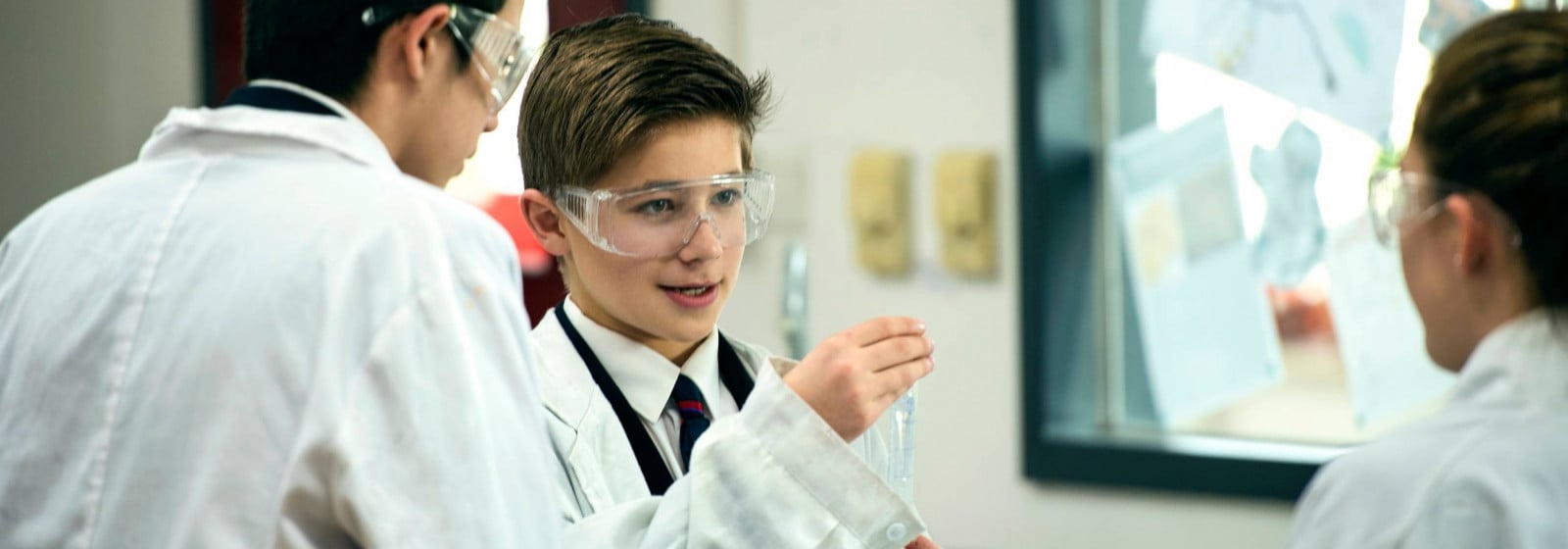 School Children Wearing Lab Coats