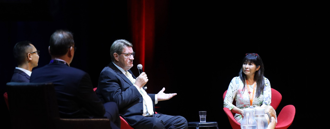 photo of Karen Yung, Co-founder of Education in Motion, and Robert Glover, Founder and Executive Director of Care for Children during Children of Shanghai documentary screening