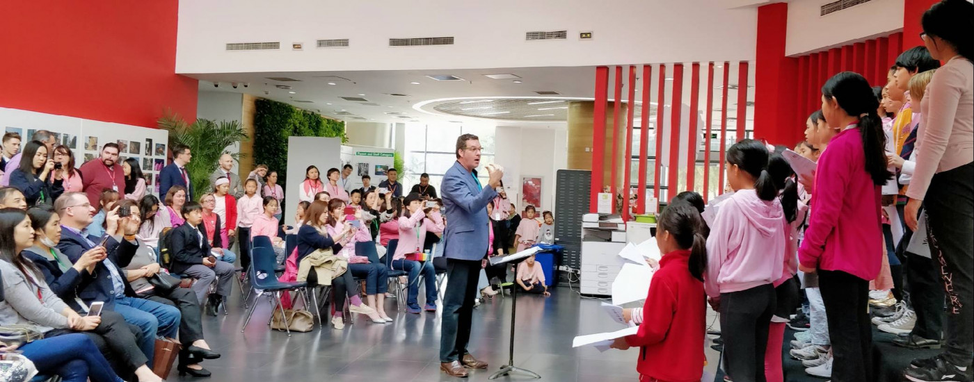 Paul Jarman conducting Lunch Concert on Pink Day at DCB