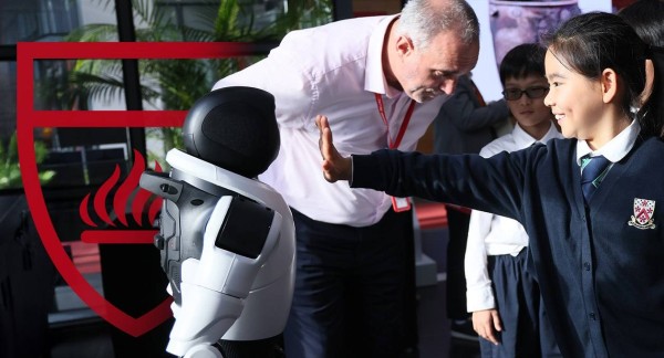 Students interacting with robot