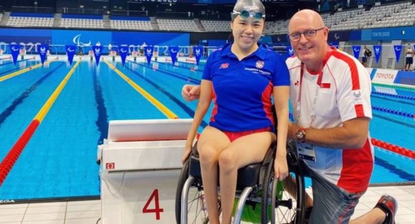 Head of Swimming Mick Massey and Singapore's Paralympic Gold Medalist Yip Pin Xiu poolside at the Tokyo 2020 Paralympics