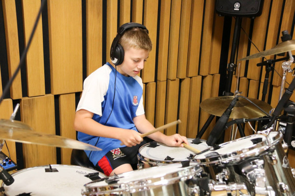 Dulwich College (Singapore) student creating music with Roo Pigott